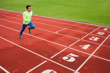 Fototapeta premium Running african man at stadium