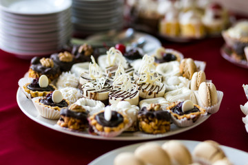 Candy Bar. Delicious sweet buffet with cupcakes. Sweet holiday buffet with cupcakes and other desserts.Table with sweets, candies, dessert