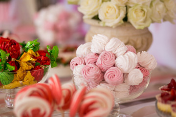 Candy Bar. Delicious sweet buffet with cupcakes. Sweet holiday buffet with cupcakes and other desserts.Table with sweets, candies, dessert