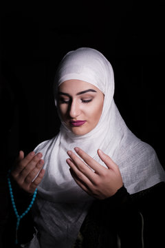Muslim Woman Praying In Dark 
