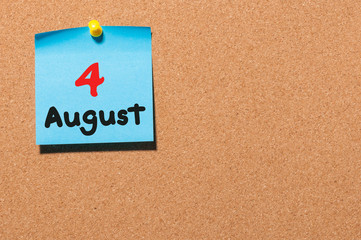 August 4th. Day 4 of month, color sticker calendar on notice board. Summer time. Empty space for text