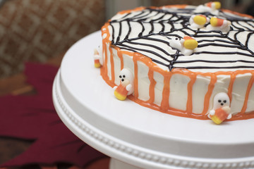 Holiday Halloween Cake with White, Orange and Black Frosting