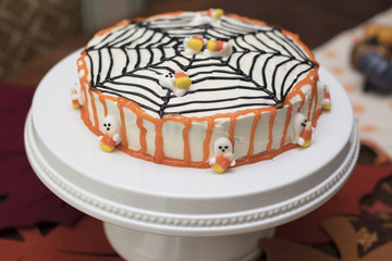 Holiday Halloween Cake with White, Orange and Black Frosting