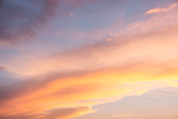Orange Clouds against the blue sunset sky