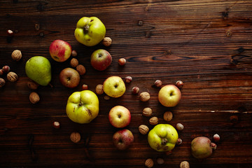 autumn fruits on wooden table