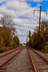 Fototapeta na wymiar Railroad blue sky and cloudy rain