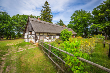 Old wooden house in Kluki, Poland © Lukasz Janyst