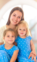 Mother with two daughters.