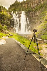 Camera and Skjervsfossen Waterfall, Norway