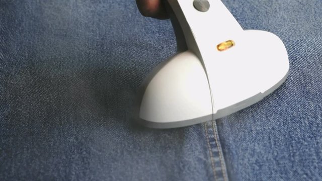 Process of steaming of jeans using steam cleaner