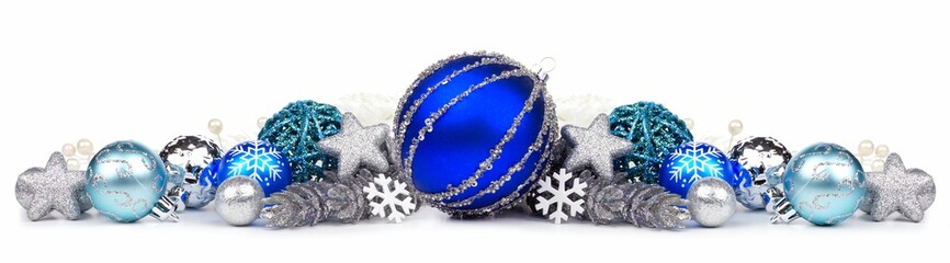 Christmas border of blue and silver ornaments on a white background