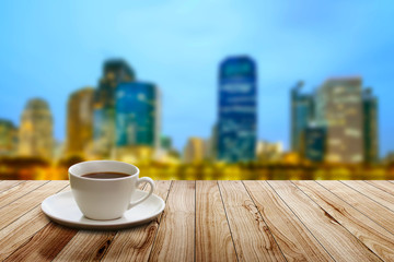 cup of coffee on city background