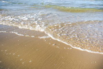 Sea wave on beach background.
