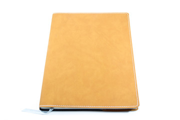 Classic leather notebook isolated in white background.
