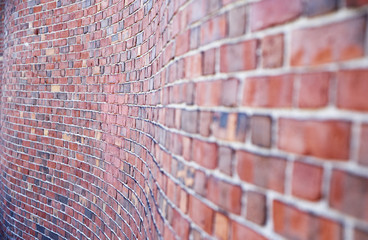curved brick wall. curve red brick wall perspective for a background 