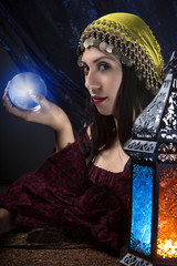 Psychic or diviner staring at a crystal ball to predict destiny or future.  Astrology. Fortune...