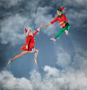 Funny kids in Peter pan and snow maiden costume.