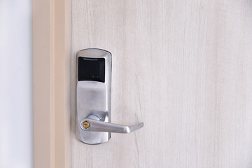 Entrance wood door with electronic keycard lock system