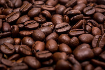 Organic coffee beans in background close up.
