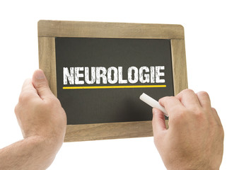 Neurologie / Hand schreibt auf Kreidetafel