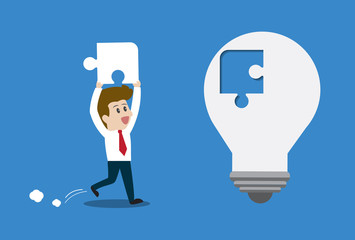 Businessman inserts the missing piece with light bulb.Vector illustration business cartoon concept.