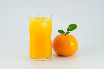 Orange juice and slices of orange isolated on white