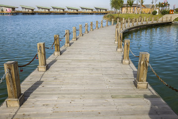 Fototapeta premium The wood bridge in park