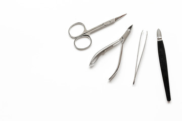 nail care - manicure set on white background top view
