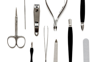 nail care - manicure set on white background top view
