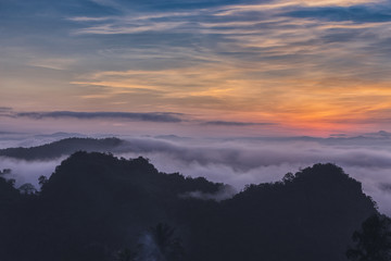 Doi pha mee national park covered by morning fog and sunrise at