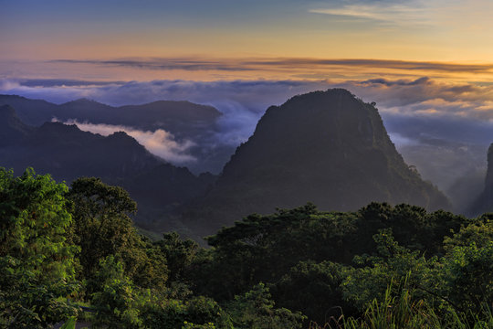 Doi pha mee national park covered by morning fog and sunrise at