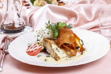 Fish with vegetables and green pea sauce