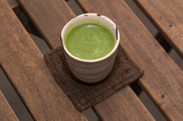 close-up of a cup of japanese matcha green tea
