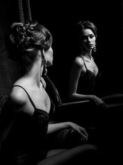 Woman in lingerie and stockings in a vintage interior