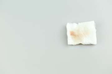 Fototapeta na wymiar White cosmetic cotton pad after used for make up remover,isolate on white background.