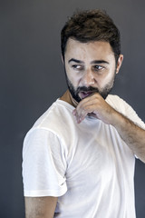 Young handsome man with beard studio portrait
