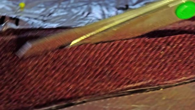 Cutting tweed with scissors