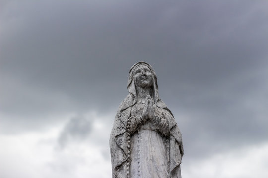 Virgin Mary stone statue