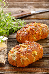 Homemade fresh bread stuffed cheese and garlic with herbs