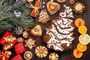 Christmas decoration and gingerbread cookies on wooden backgroun