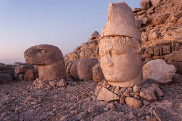 Toppled heads of the gods on East terrace at the top of Nemrut d