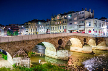 View of the latin bridge and historic centre of Sarajevo - Bosnia and Herzegovina in the night