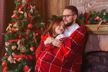 Happy couple in love with red plaid - 125795987