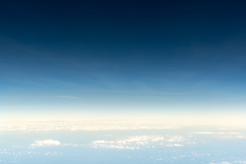 Fototapeta na wymiar Cloudscape skyline view above white clouds and blue sky