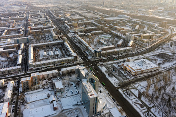 Tyumen, Russia - January 23, 2016: Aerial view on city quarters, office area and residential district Republic street
