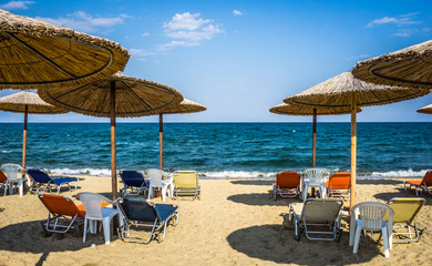Beautiful Seascape With Sun Umbrellas And Sunbeds, Stavros, Greece