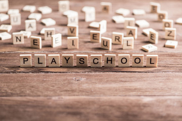 wooden elements with letter collected word playschool