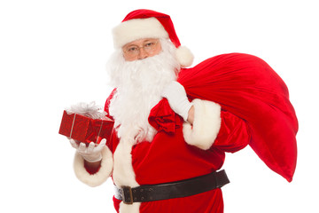 Santa Claus: Cheerful With Small Stack Of Gifts big bag, isolated on white background Christmas.