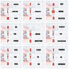 Hand of business man completing the puzzle