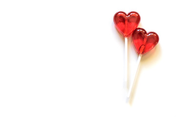 Two lollipops. Red hearts. Candy. Love concept. Valentine day